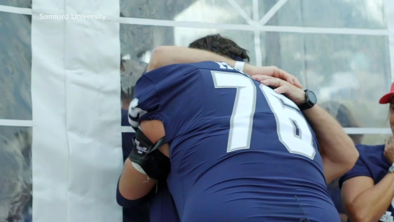 Samford football player honors stepfather with name change in emotional video