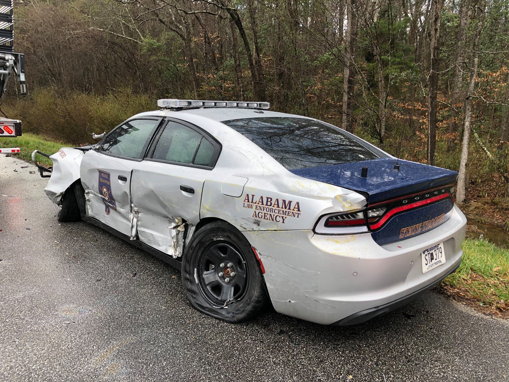 State Trooper car hit by truck during traffic stop
