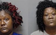 Women charged with removing ill mother from ambulance