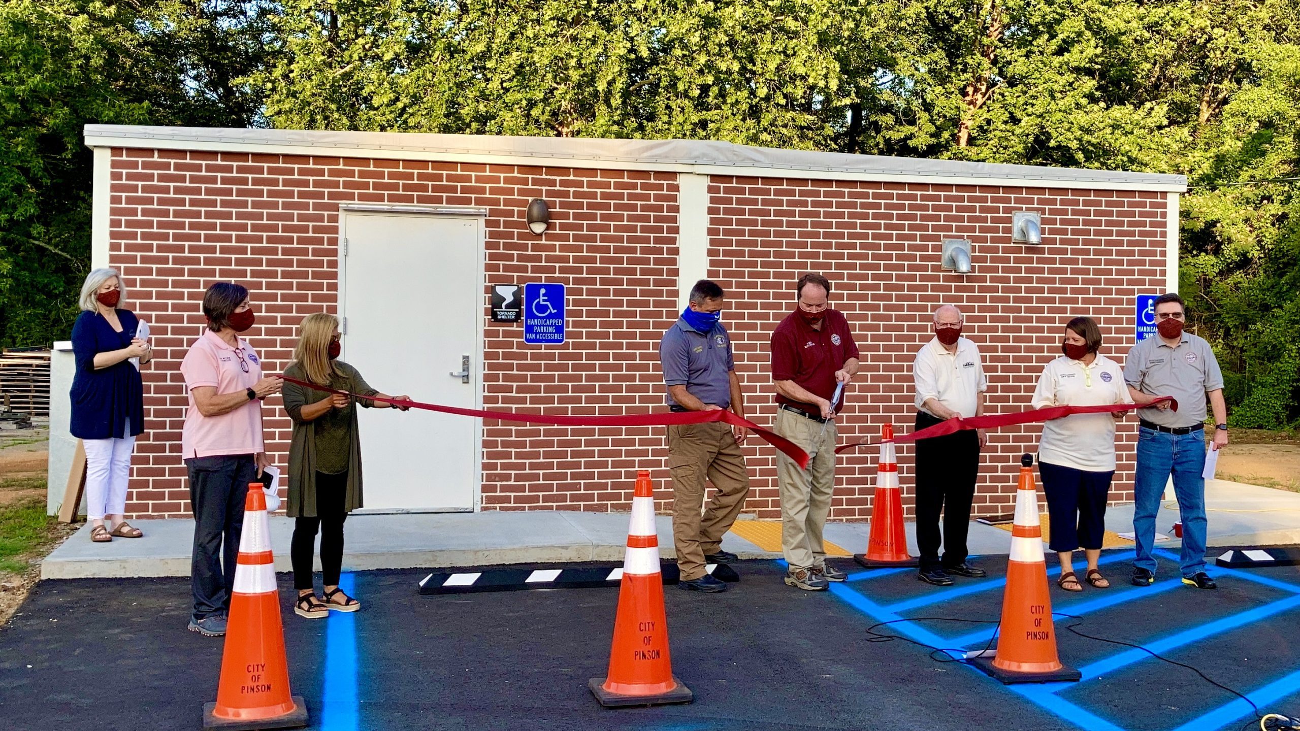 Pinson Council cuts ribbon for 100-person tornado shelter in Palmerdale
