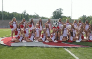 VIDEO: A peek at picture day for the Husky cheerleaders and band