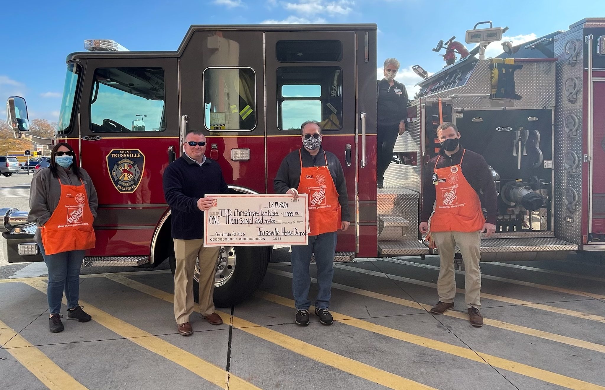 Trussville Home Depot donates $1,000 to Christmas for Kids