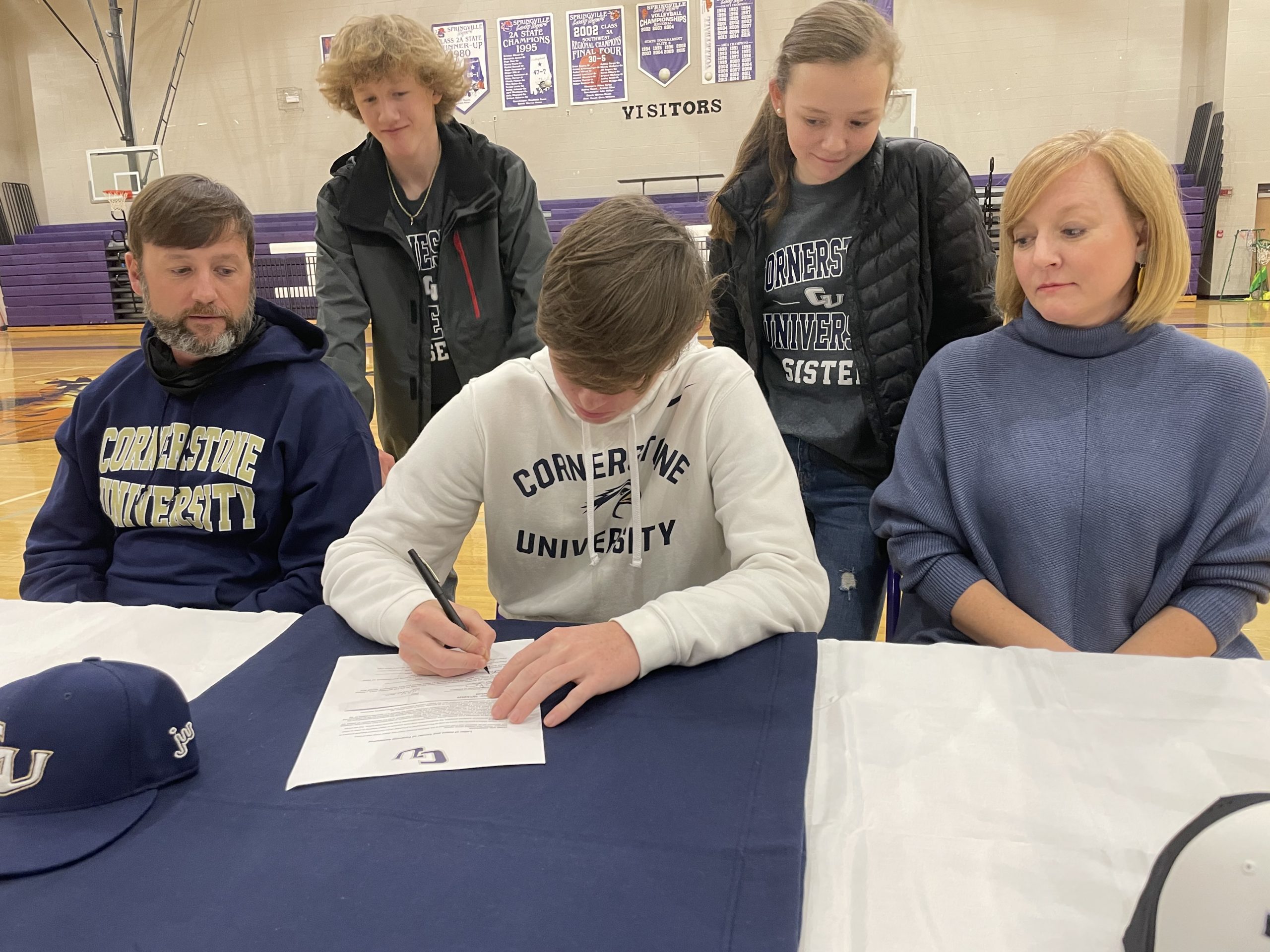 Springville trio signs on dotted line