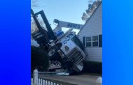 BREAKING: Boom truck smashes through two homes in Trussville