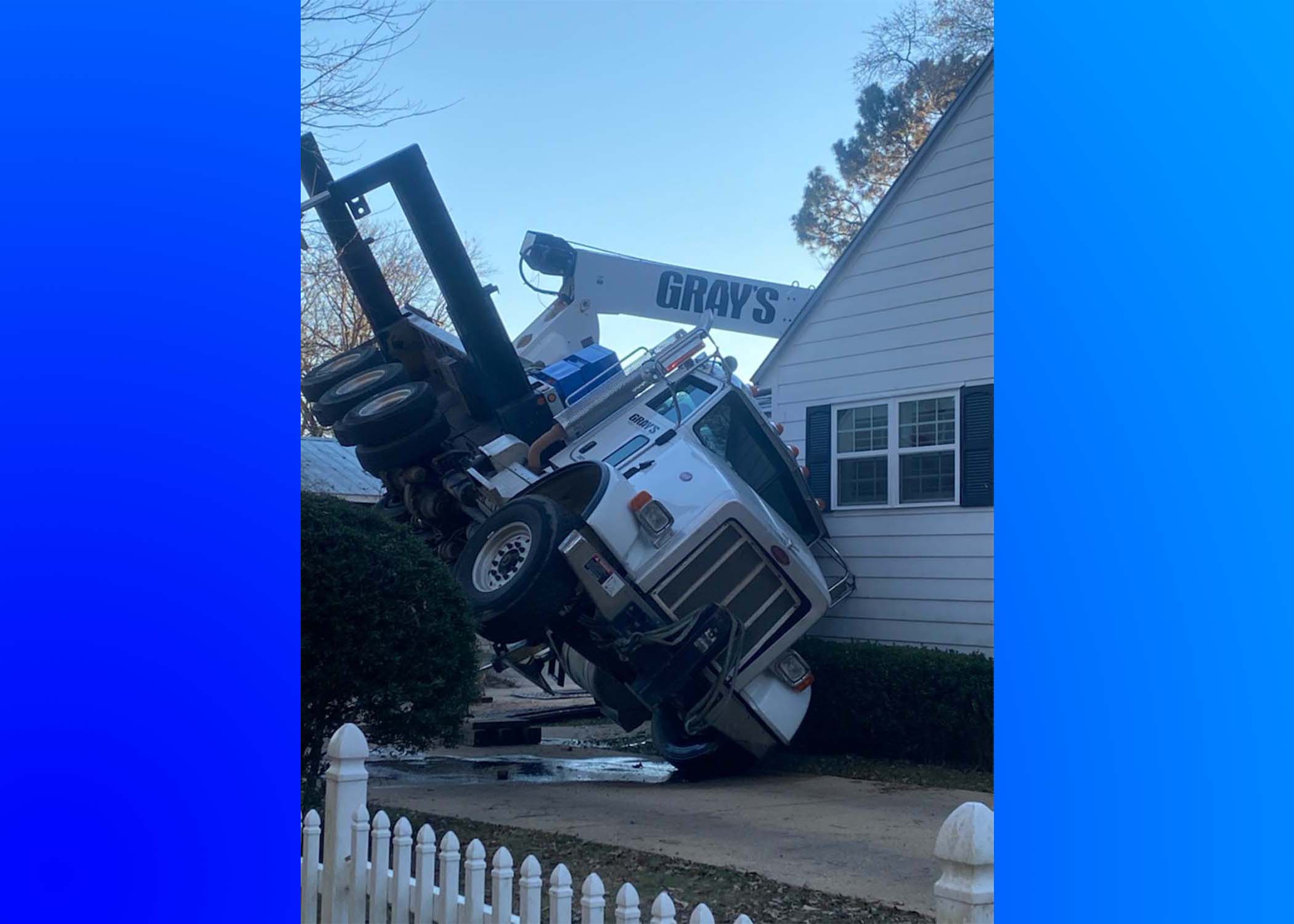 BREAKING: Boom truck smashes through two homes in Trussville