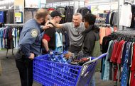 ADCNR officers aid youth at shop with a cop events
