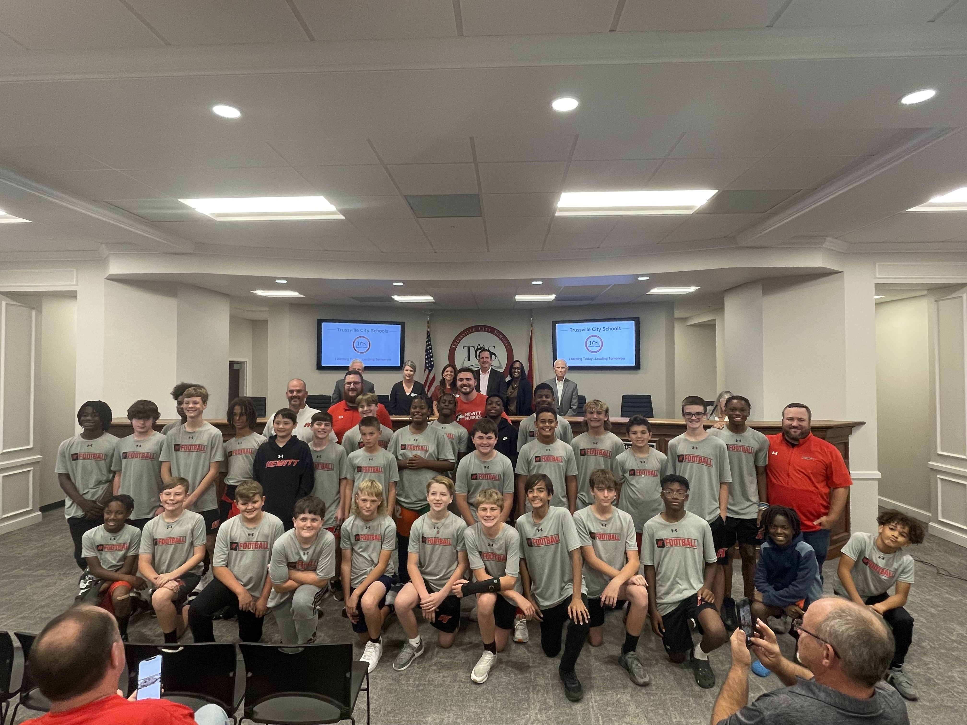 HTMS 7th grade football team recognized during TCS BOE