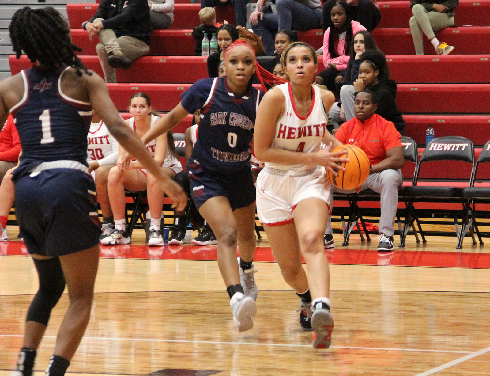 Lady Huskies roll all over Park Crossing, 69-26