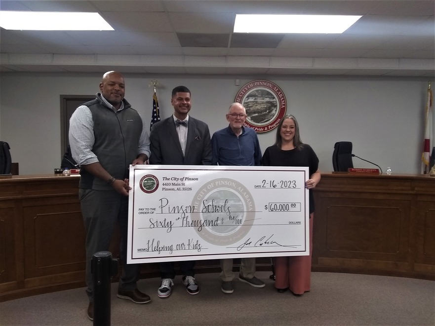 Pinson council presents $60,000 check to schools