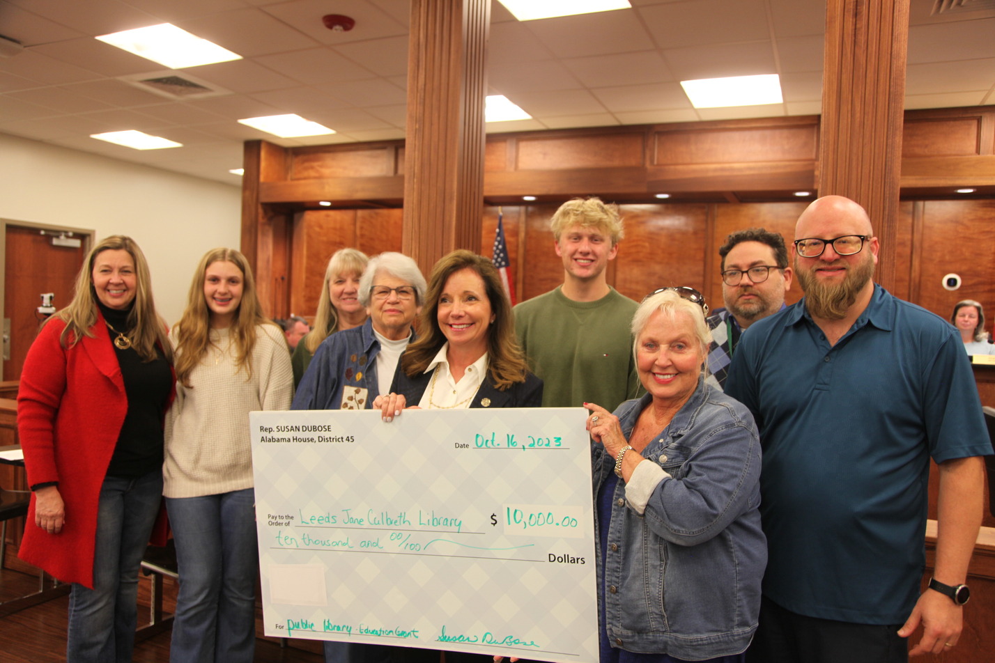 Susan DuBose presents $10,000 to library at council meeting, LHS Band raising money for trip